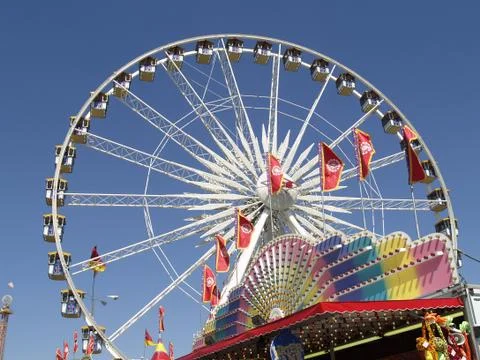 Large ferris wheel at fairgrounds Stock Photos