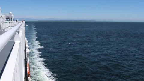 Large ferry crossing the sea, side view looking back Stock Footage 342788302