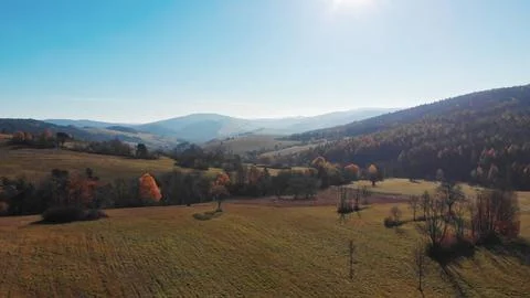 Large fields and mountains in the background on an autumn day, Bieszczady Poland Stock Photos