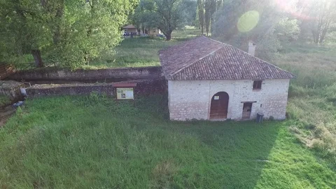 Large fields cultivated with mill and river, drone shooting Stock Footage 126610855