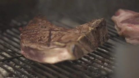 Large fiorentina steak on the grill Stock Footage 82026552