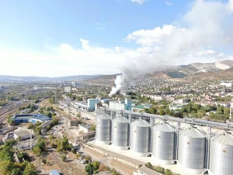 Large fire at a building materials warehouse in a industrial area Stock Photos