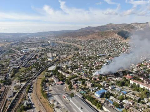 Large fire at a building materials warehouse in a industrial area Stock Photos