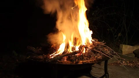 Large Fire burning in a fire put. 動画素材 58410663