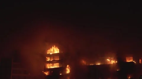 Large fire burns down a 14-story residential building in the city of Valencia Stock Footage 266917165