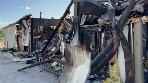 Large fire at a Dollar General Store rear collapse Stock Footage 333780809