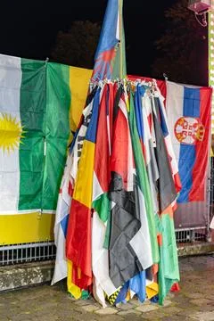 A large flag pole with many flags hanging from it Foto stock