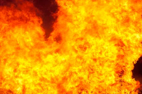 Large flame from a house fire Stock Photos