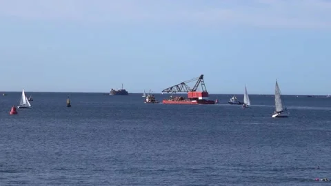 Large floating crane being towed across Plymouth Sound England. Stock Footage 136949198