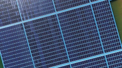 Large floating solar farm viewed from above, showing hundreds of blue Stock Footage 337231083