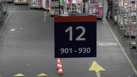 Large flower auction distribution center close up of 12 sign 4k Stock Footage 78158738