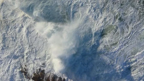 Large Foamy Wave Rolling On The Surface Of A Stormy Ocean - Aerial Top Down Stock Footage 327452103