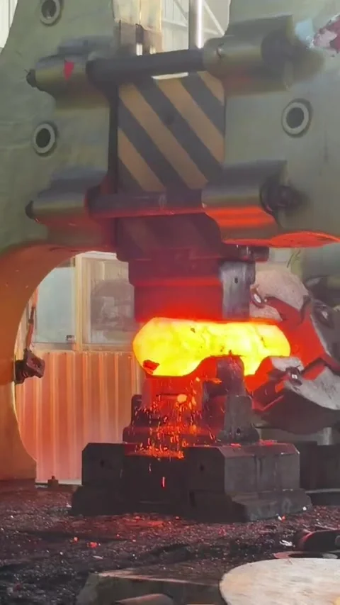 Large Forging Press Hammering Molten Hot Steel in a Manufacturing Factory China Stock Footage 339203388