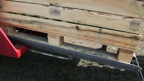 Large forklift unloading crate Stock Footage 81078190