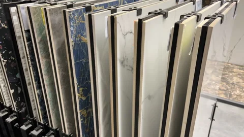 Large Format Ceramic Tile Samples Displayed on Rack in Showroom | Marble Stone Stock Footage 330504279