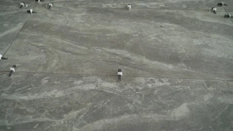 Large format floor tiles, grey. Vidéo 260836159