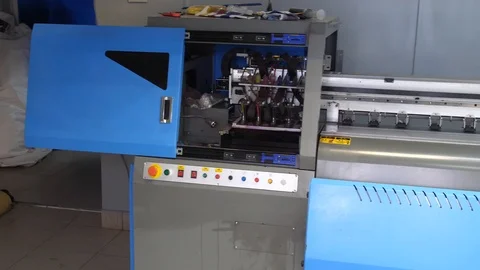 Large format inkjet printing press standing in the printing workshop. Panorama Stock-Footage 99533928