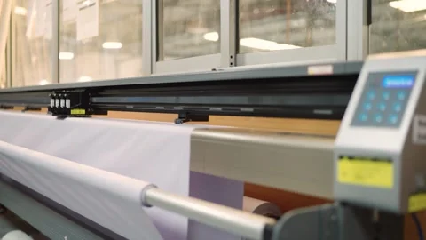 Large Format Plotter Printing Banner or Tent Material in Factory Stock Footage 321403183