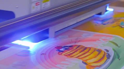Large format printer is printing colorful promotional material Stock Footage 329944387
