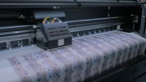 Large format printer is printing colorful promotional material Stock Footage 329945659