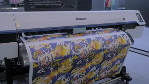 Large format printer is printing colorful promotional material 動画素材 347245303