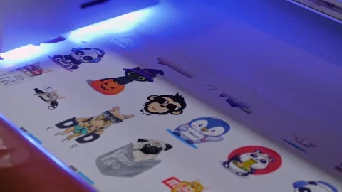 Large format printer is printing colorful banner, poster with cartoon animals 動画素材 347246294
