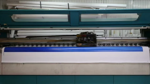 Large format printer printing on a roll of paper at high speed Stock Footage 116860772