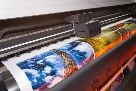 Large format printing machine in operation Stock Photos