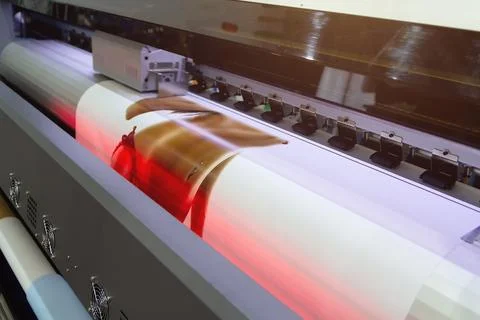 Large format printing machine in operation Stock Photos