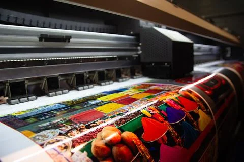 Large format printing machine in operation Stock Photos