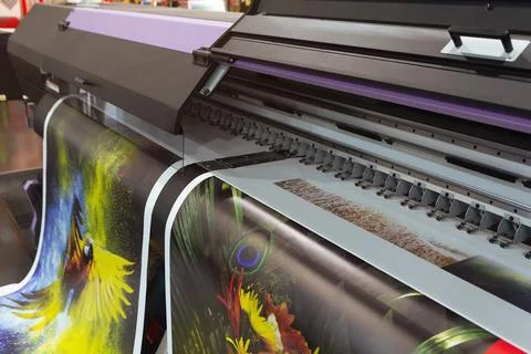 Large format printing machine in operation Stock Photos