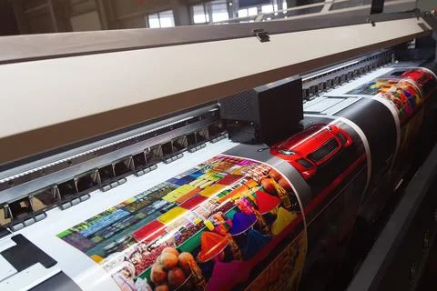 Large format printing machine in operation Stock Photos