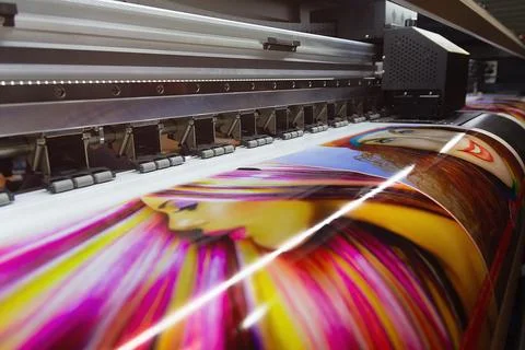 Large format printing machine in operation Stock Photos