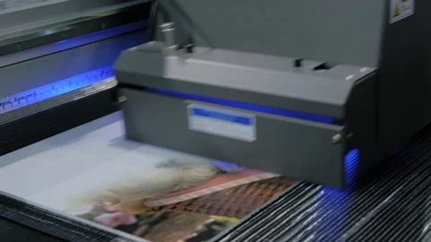 Large format printing - UV digital flatbed printer during work at printing house Stock Footage 144700770