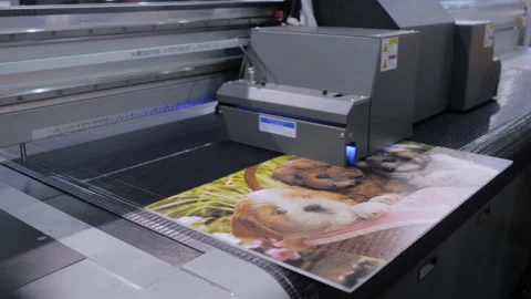 Large format printing - UV digital flatbed printer during work at printing house Stock Footage 150800398