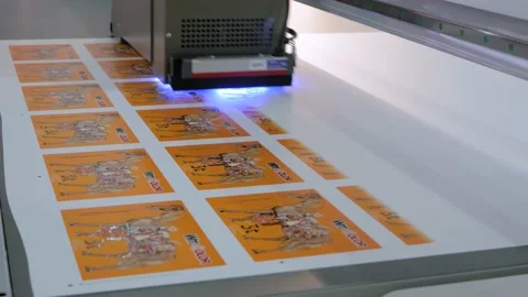 Large format printing - UV digital flatbed printer during work at exhibition Stock Footage 159911154