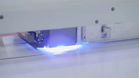 Large format printing - UV digital flatbed printer during work at printing house Stock Footage 161357042