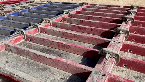 Large formwork board connected by clamps from several boards Stock Footage 239827197