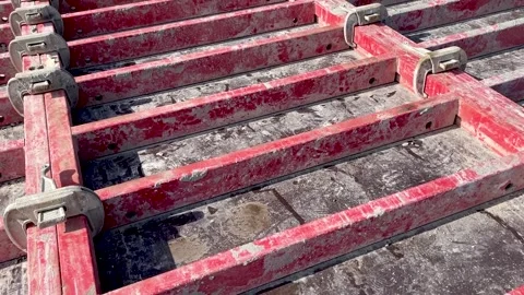 Large formwork board connected by clamps from several boards Stock Footage 242789126