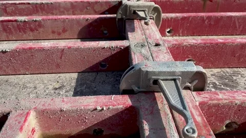 Large formwork board connected by clamps from several boards Stock Footage 243371721