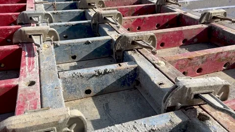 Large formwork board connected by clamps from several boards Stock Footage 245486848