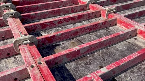 Large formwork board connected by clamps from several boards Stock Footage 246976193