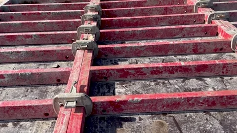 Large formwork board connected by clamps from several boards Stock Footage 246976961