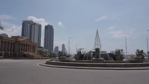 Large fountain with lions e view from Port City Colombo, Chaithya road Stock Footage 331644553