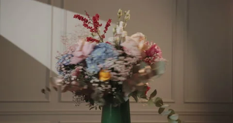 Large frame of colorful flowers rotating around its axis. Blurred rotation Video stock 178140155