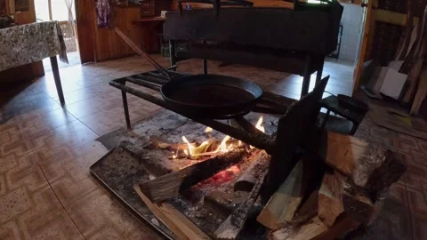 Large frying pan over an open fire Video stock 255798476