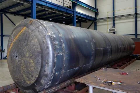 Large fuel tank on rollers Stock Photos