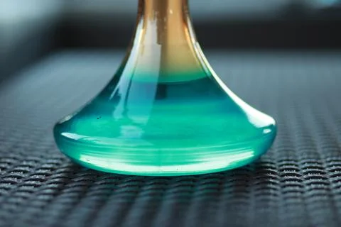 Large full glass close-up on the table Stock Photos