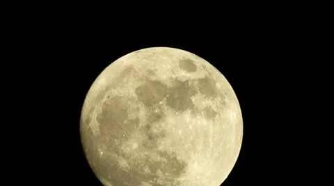 Large Full Golden Moon as it Rises and Then Moves Through the Entire Frame Stock Footage 47841617