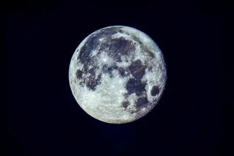Large full moon on a black background 스톡 사진